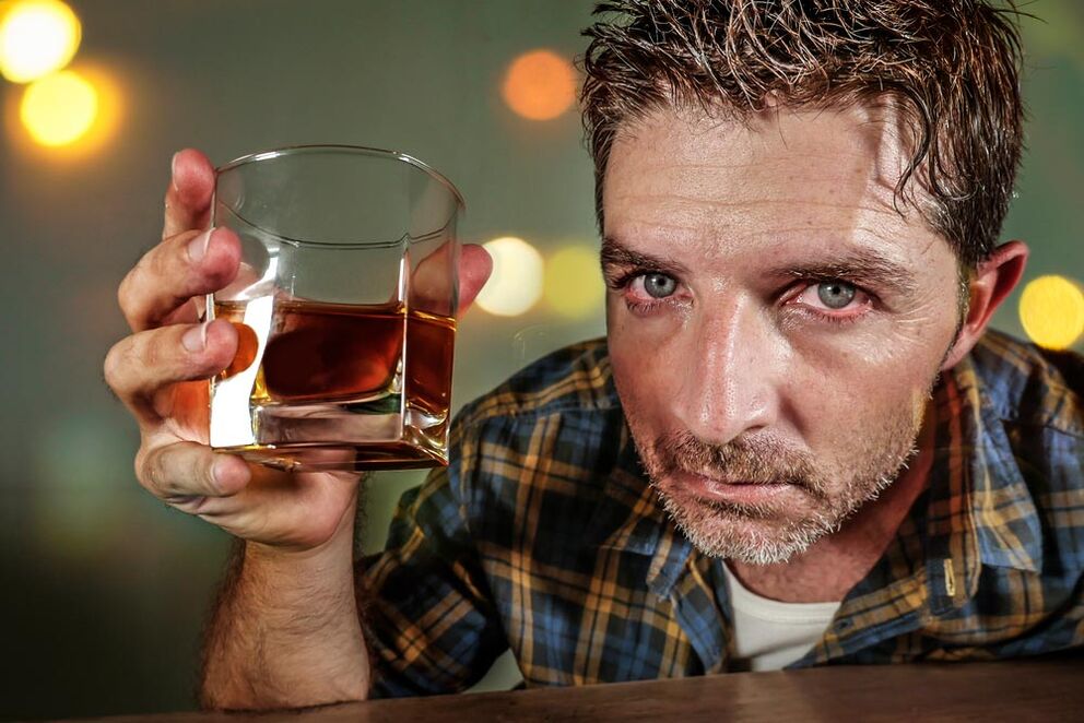 An alcoholic man looks painful